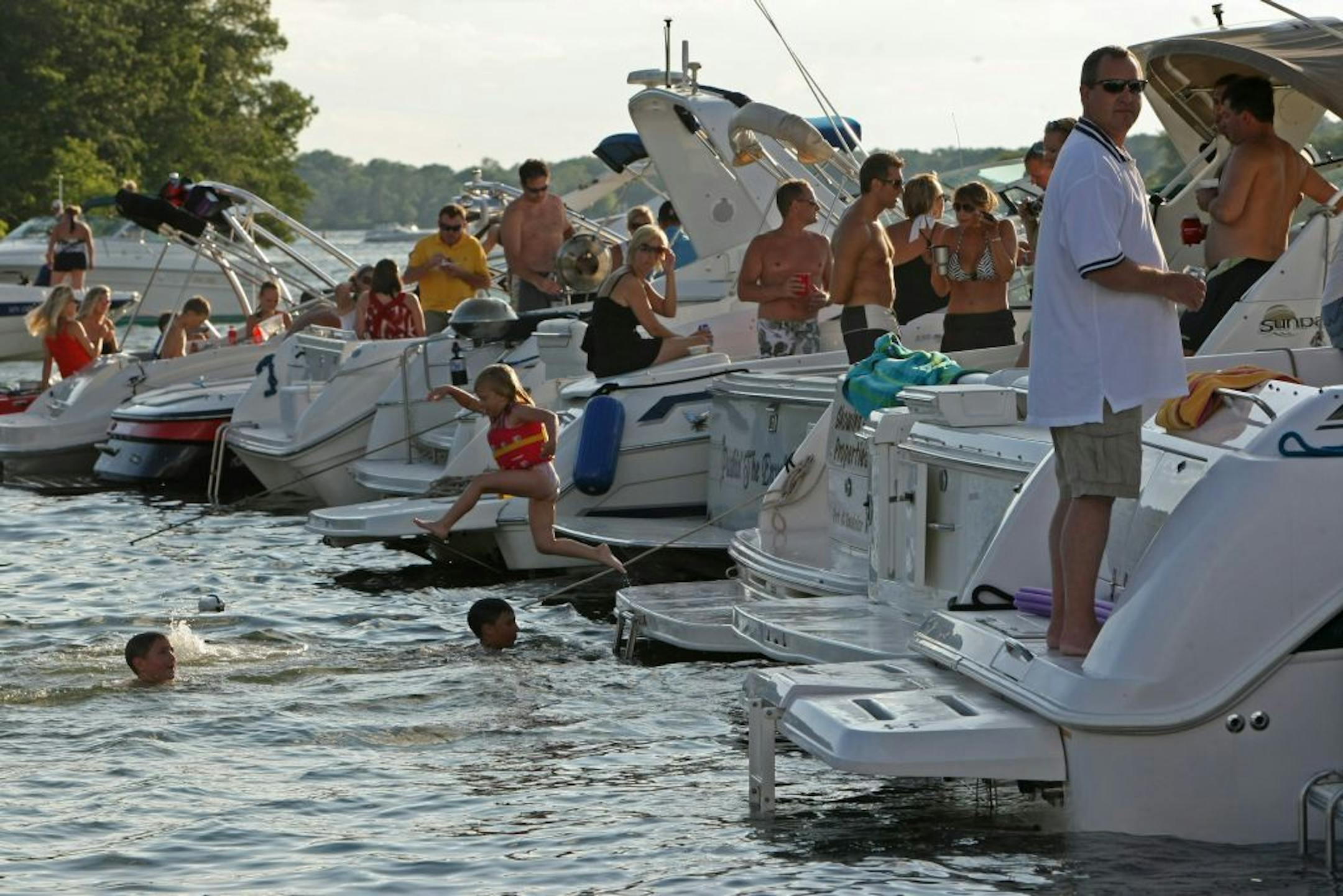 Boaters gathered at the big screen set up on Big Island for the annual boat-in-theatre sponsored by Marine Max. The theatre is set up by Twilight Zone Outdoor Cinema.