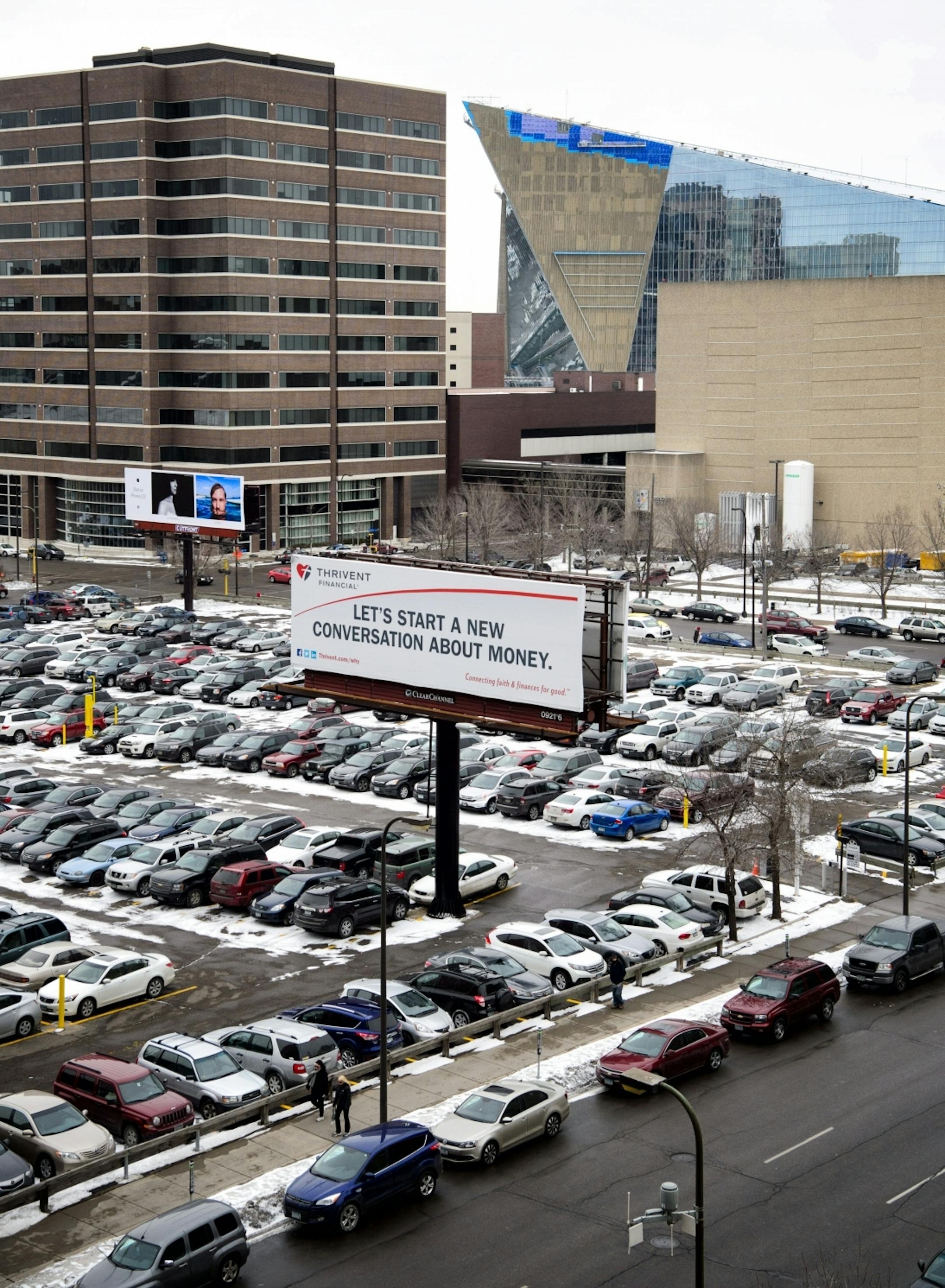 The Trivent surface parking lot at the corner of Portland Ave between 6th and 7th Streets.US Bank Stadium where the Minnesota Vikings will play in six months.