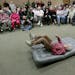 Elliott Royce, 94, demonstrated how to fall to a group of seniors at the Sabes Jewish Community Center, Thursday, February 12, 2015 in St. Louis Park,