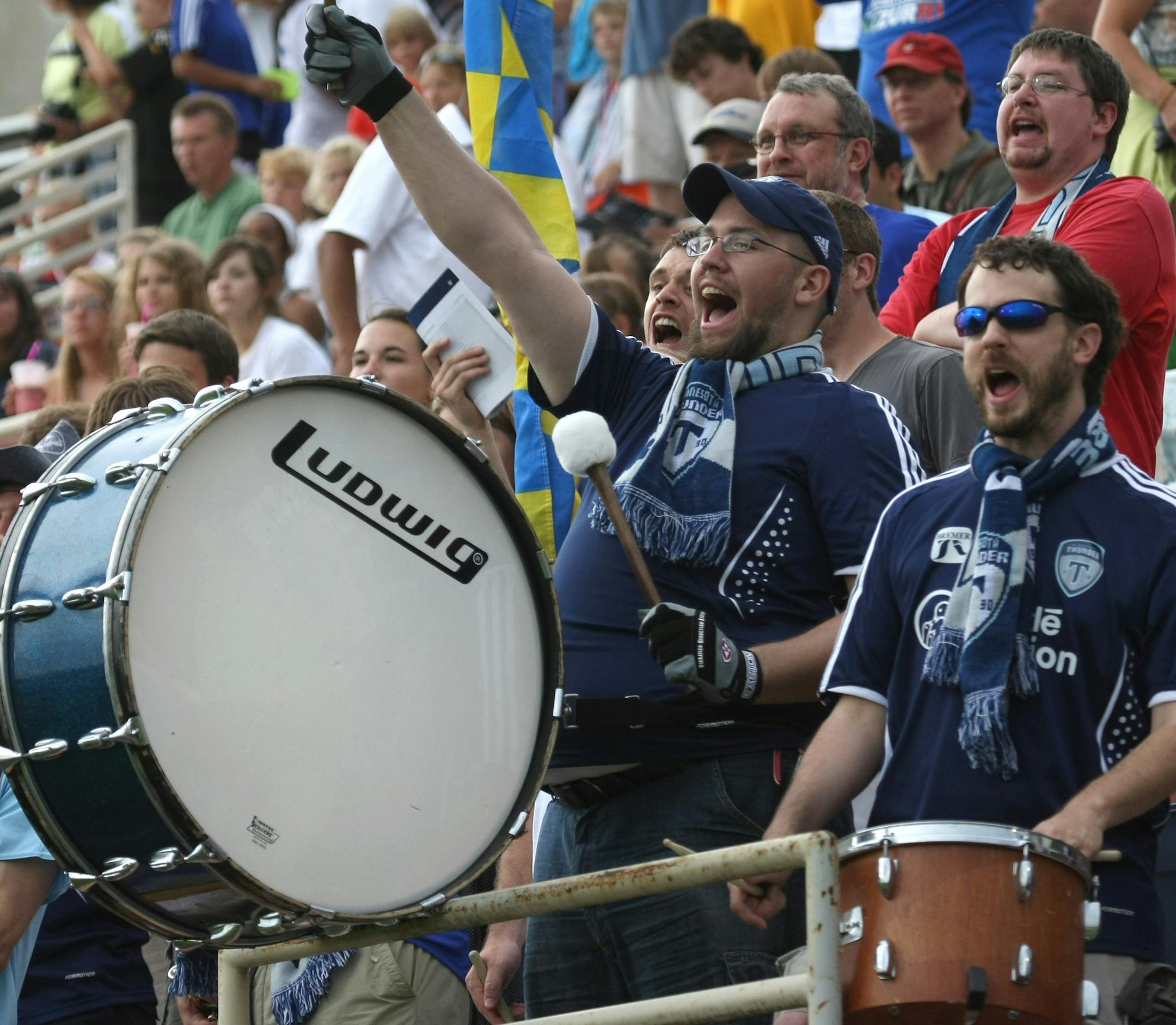 BRUCE BISPING ï bbisping@startribune.com Blaine, MN., Friday, 7/11/2008] Members of the Dark Clouds fan group cheered on the Minnesota Thunder as they took on the Carolina RailHawks. NOT FOR DAILY-FOR FUTURE STORY.