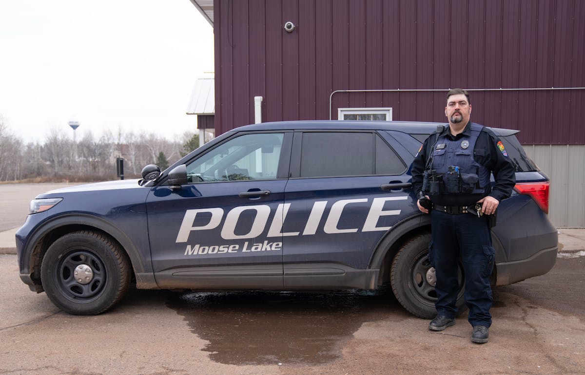 Chad Pattison, the last police officer in Moose Lake, poses for a portrait Tuesday, Feb. 06, 2024, outside the Moose Lake Police Station in Moose Lake