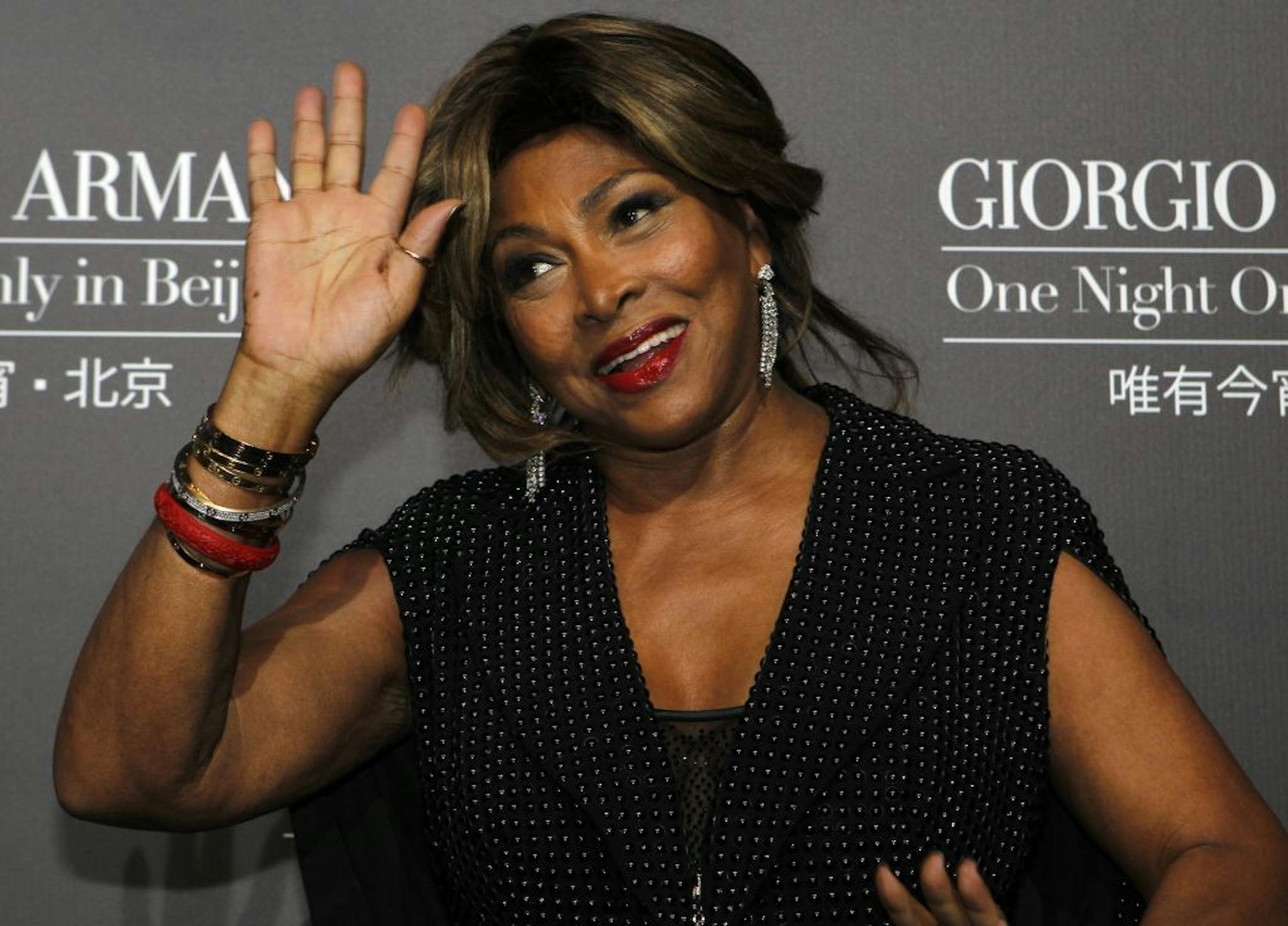 FILE - A Thursday, May 31, 2012 photo from files showing U.S. singer actress Tina Turner arriving for the Giorgio Armani fashion show held in Beijing. Legendary rock singer Tina Turner has married her longtime German beau, Erwin Bach, in a Swiss civil ceremony. The mayor of Kuesnacht, the wealthy Zurich-area community where Turner lives, says that she and Bach, a music executive, were married several weeks ago at the registry office. Markus Ernst told The Associated Press on Thursday, July 18, 2
