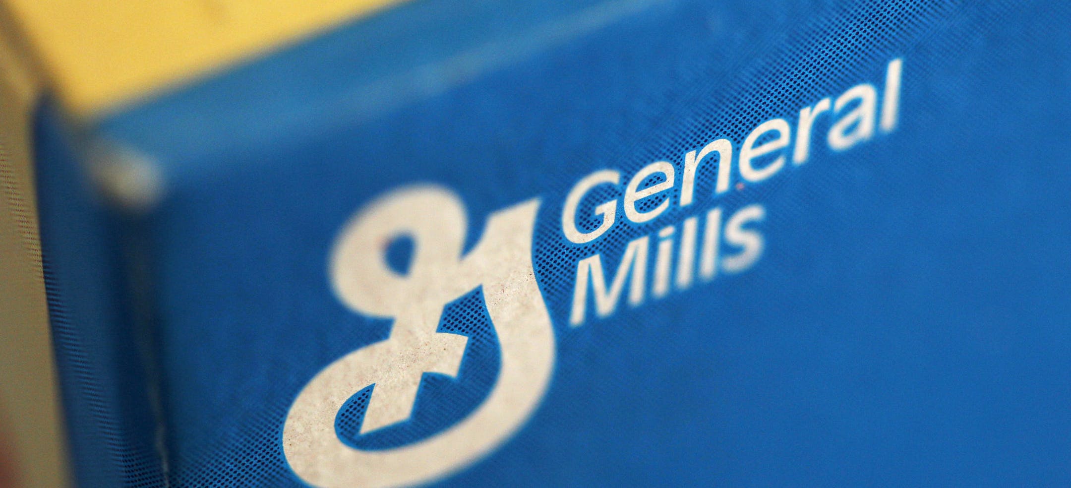 FILE - This Sept. 20, 2011 file photo shows the General Mills logo on a box of Fiber One cereal, in Philadelphia. In a Tuesday, Sept. 30, 2014 regulatory filing, General Mills said it plans to cut approximately 700 to 800 jobs, the second time it's trimmed its work force in a month, as the food company adjusts for a shift by U.S. consumers away from boxed or frozen meals. (AP Photo/Matt Rourke, File)