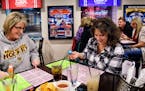 Lisa Paal and Debbie Dodge, friends and sisters-in-law played bingo at Sticks and Stones Sports Bar in Blaine. ] GLEN STUBBE * gstubbe@startribune.com