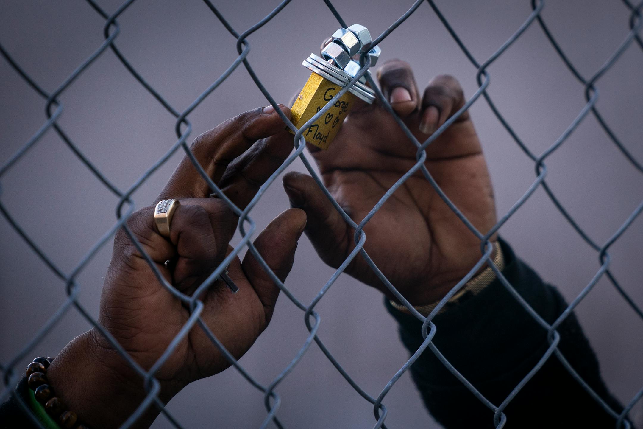 A lock for George Floyd was placed on the fence outside the Hennepin County Government Center during the Locks for Loved Ones Lost: Part II event.