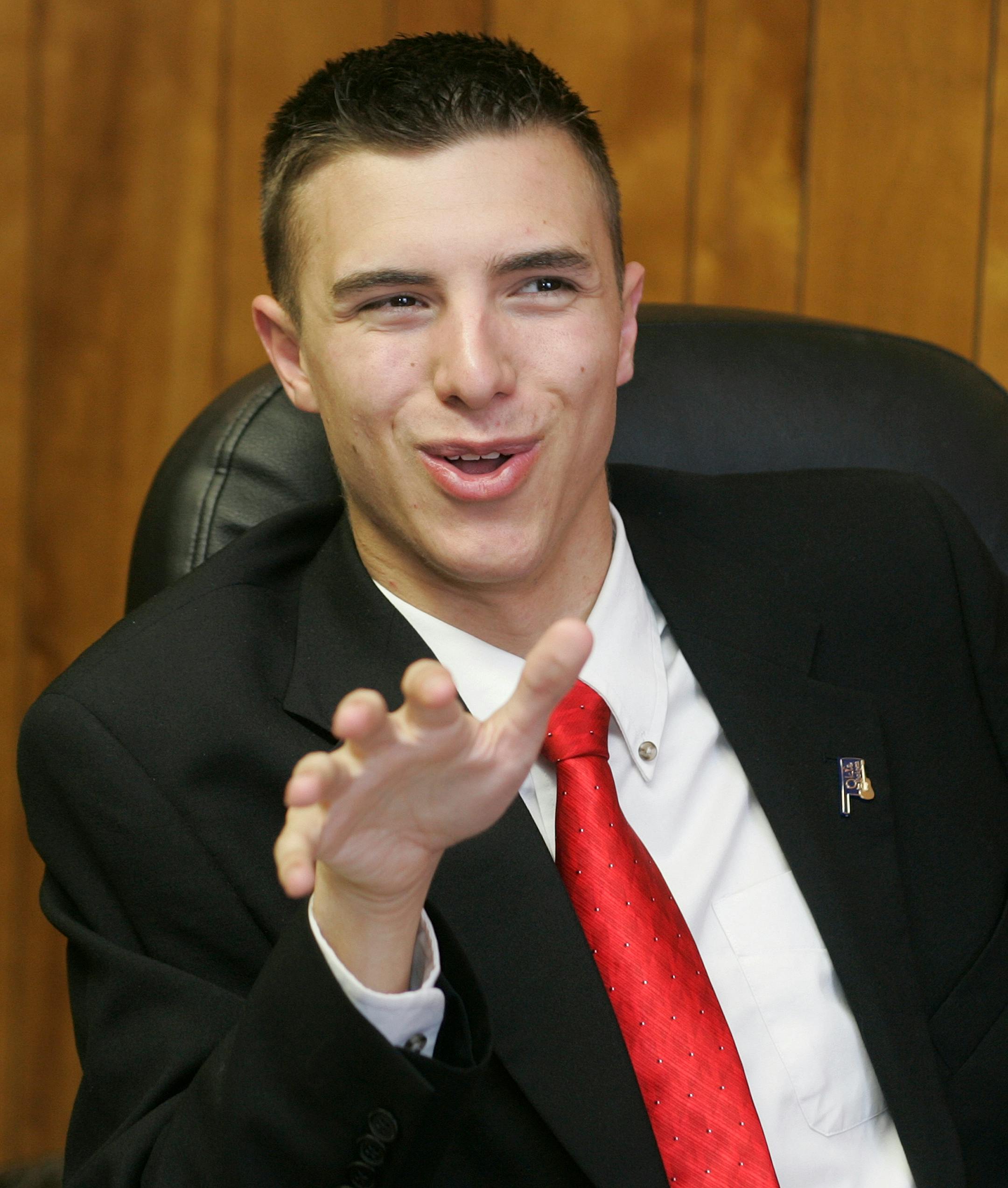 John Tyler Hammons, the 19-year-old newly elected mayor of Muskogee, Okla., gestures as he speaks during an interview in his new office in Muskogee, Okla., Thursday May 15, 2008. The University of Oklahoma freshman is moving out of a dorm and back in with his parents as he prepares to be sworn in next week as mayor of this 38,000-person eastern Oklahoma city made famous in Merle Haggard's "Okie From Muskogee."