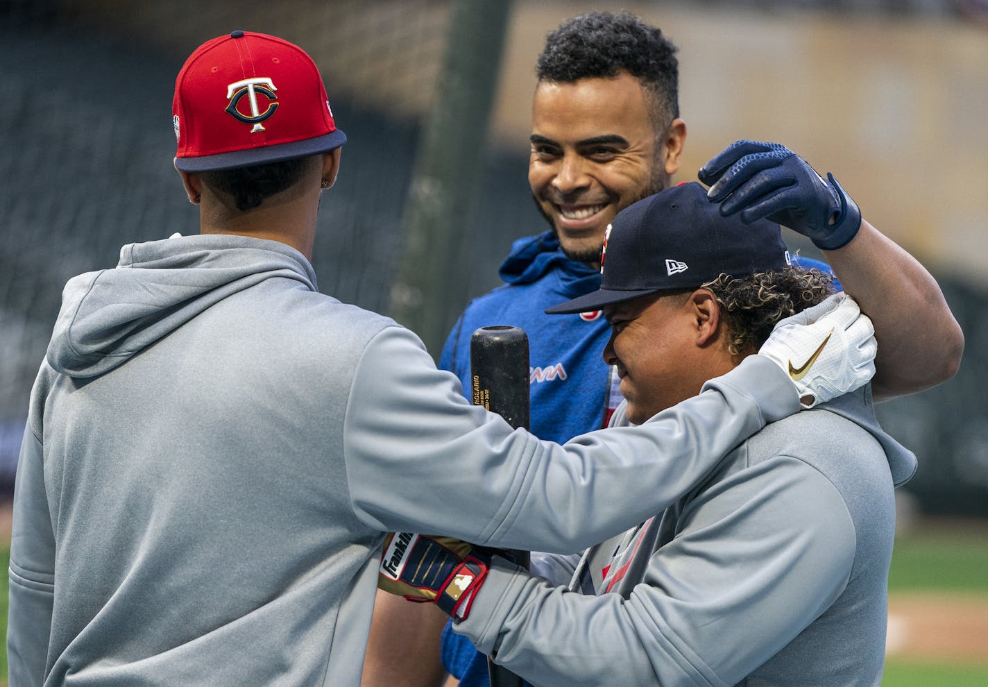 Minnesota Twins right fielder Eddie Rosario (20), from left, Minnesota Twins designated hitter Nelson Cruz (23) and Minnesota Twins infielder Willians Astudillo shared a jovial moment during the Twins workout. ] LEILA NAVIDI &#x2022; leila.navidi@startribune.com BACKGROUND INFORMATION: Workout day and media availability for the Twins and the Yankees ahead of Game 3 of their ALDS matchup at Target Field in Minneapolis on Sunday, October 6, 2019.