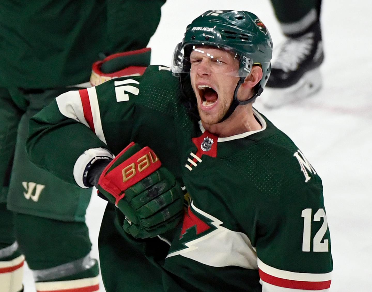 Minnesota Wild center Eric Staal (12) celebrates scoring against the Colorado Avalanche during the third period of an NHL hockey game Saturday.