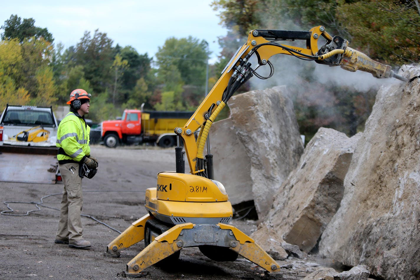 Eric Lewis of Maverick Cutting & Breaking demonstrated a robotic demolition at Frattalone Companies in Little Canada, MN, Tuesday, October 22, 2013. The Minnesota Construction Association held the demonstration to show how robots are being used for demolition work in spaces that are too small or confined or high up to use wrecking balls and backhoes. (ELIZABETH FLORES/STAR TRIBUNE) ELIZABETH FLORES &#x2022; eflores@startribune.com