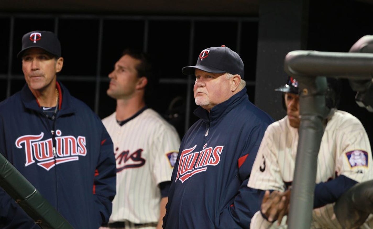 Twins bench coach Scott Ullger left and manger Ron Gardenhire watched the last out during Tuesday night's 5-4 loss to Seattle.