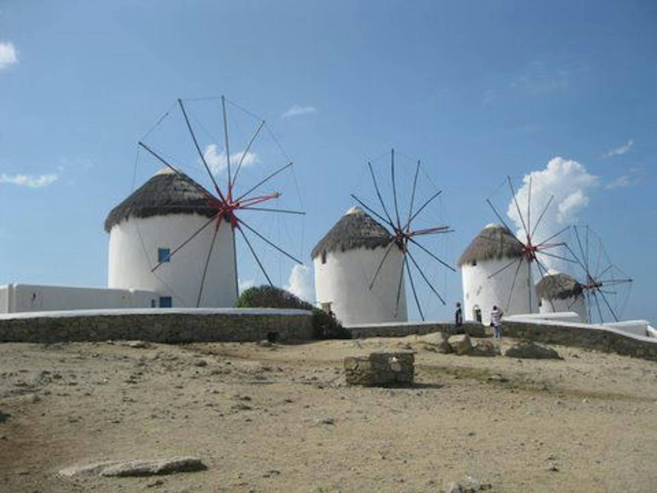 Windmills are a trademark of the Greece island of Mykonos. They date to the 16th century and were used to grind wheat.