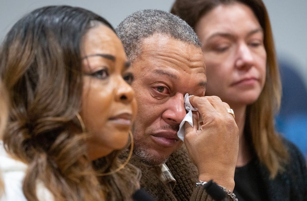 Terell Smith, the grandfather of Carlos Dickerson, wiped tears from his eyes during a Minnesota Board of Pardons hearing regarding Carlos Tuesday, Dec. 20, 2022 at the Senate Office Building in St. Paul