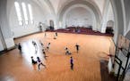 Twin Cities German Immersion School students played in the former Catholic church turned gymnasium Tuesday. ] AARON LAVINSKY &#xef; aaron.lavinsky@sta