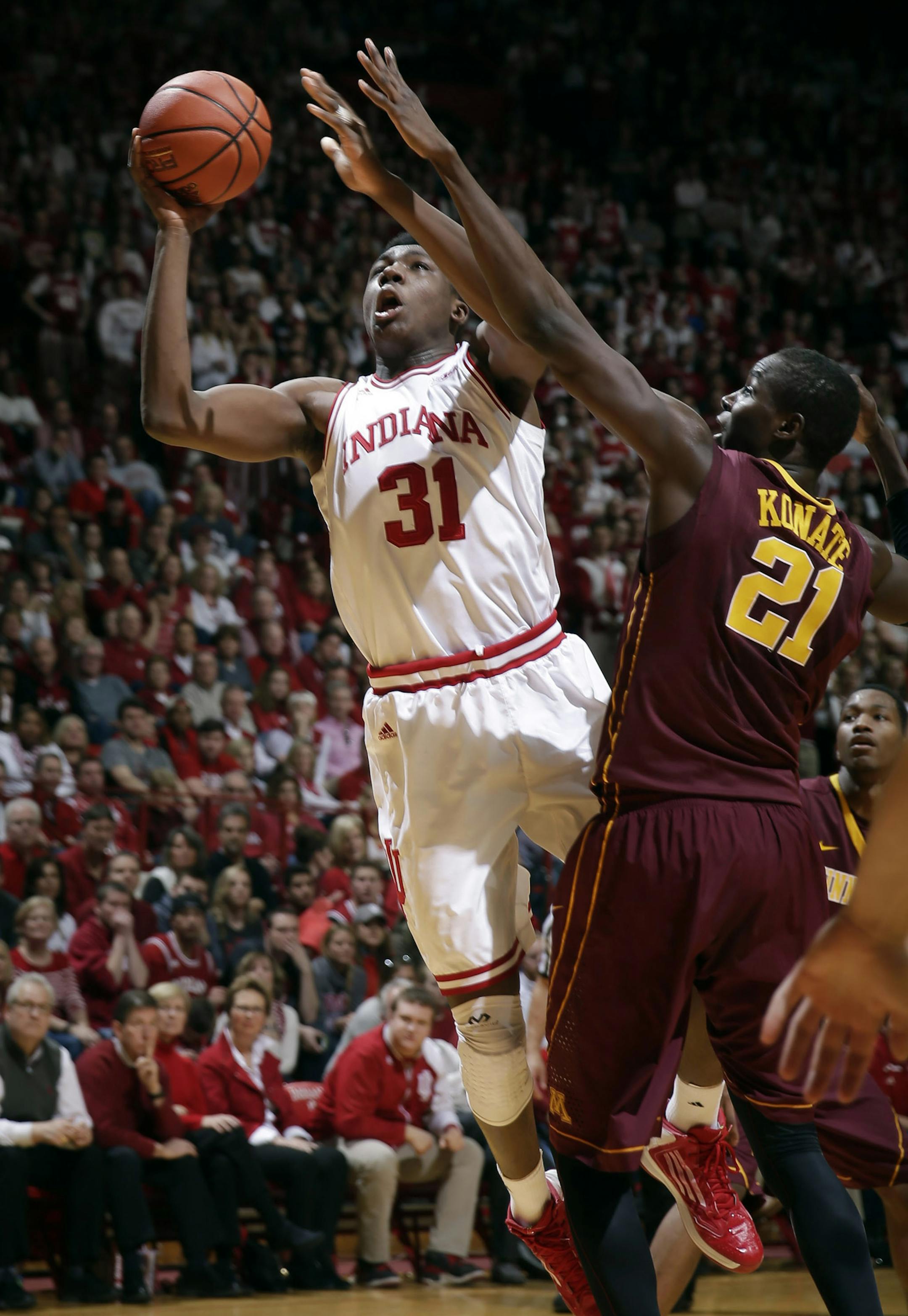 Indiana center Thomas Bryant (31) shoots over Minnesota center Bakary Konate (21) in the second half of an NCAA college basketball game in Bloomington, Ind., Saturday, Jan. 30, 2016. Indiana won 74-68. (AP Photo/AJ Mast)