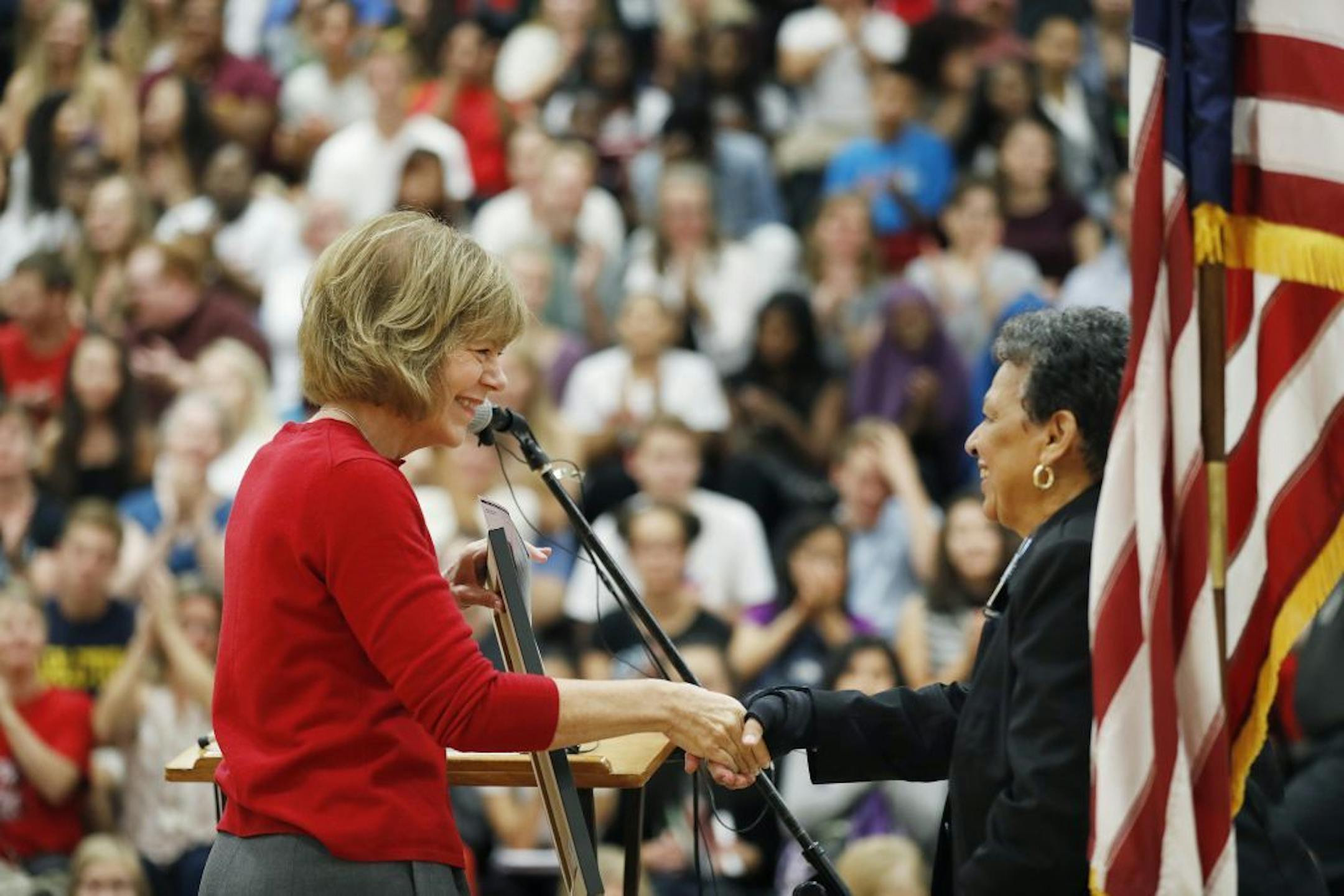 Lt. Governor Tina Smith left presented St. Paul Central High School principal Mary Mackbee with a proclamation from Governor Mark Dayton Tuesday September 6, 2016 in St. Paul, MN.