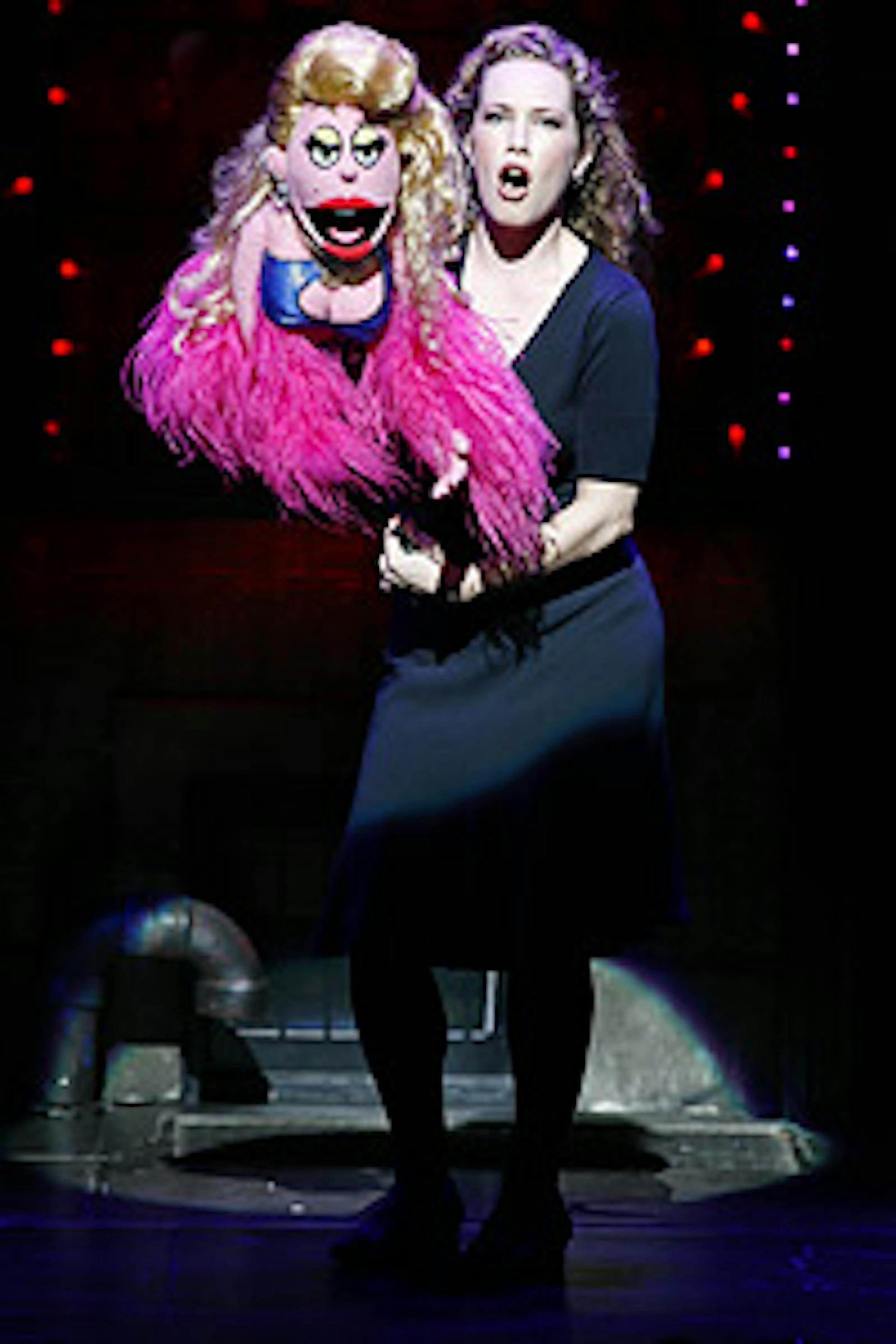 Lucy the Slut, left, performed by Kelli Sawyer