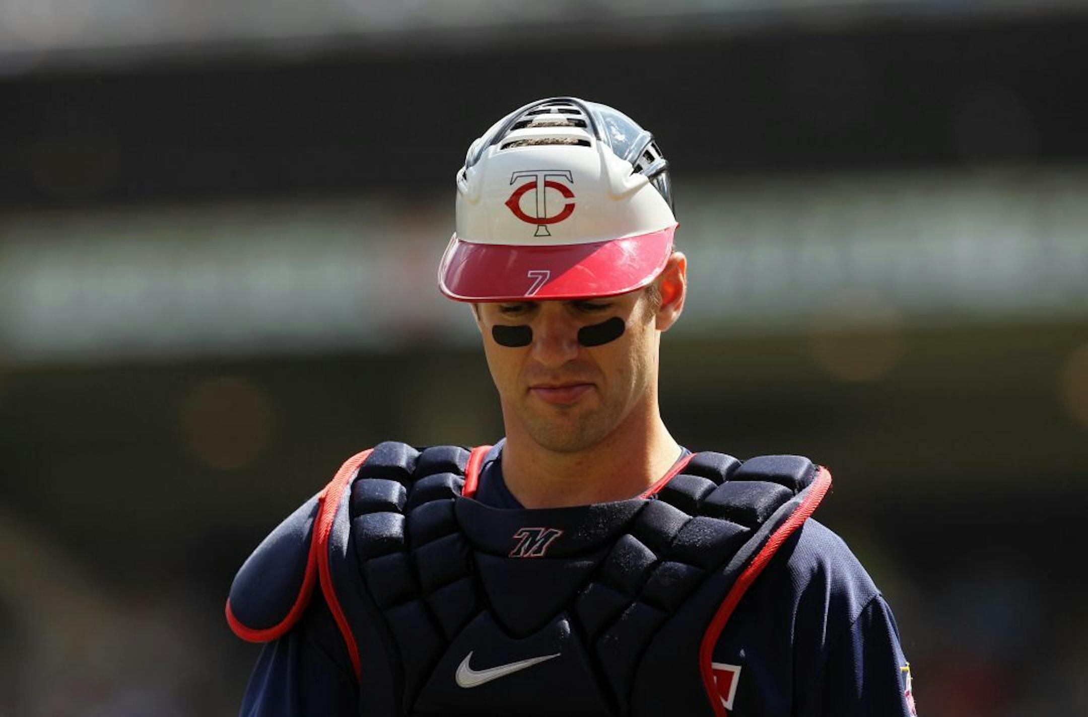 Minnesota Twins catcher Joe Mauer (7) shown in a baseball game, Wednesday, Aug. 1, 2012, in Minneapolis.