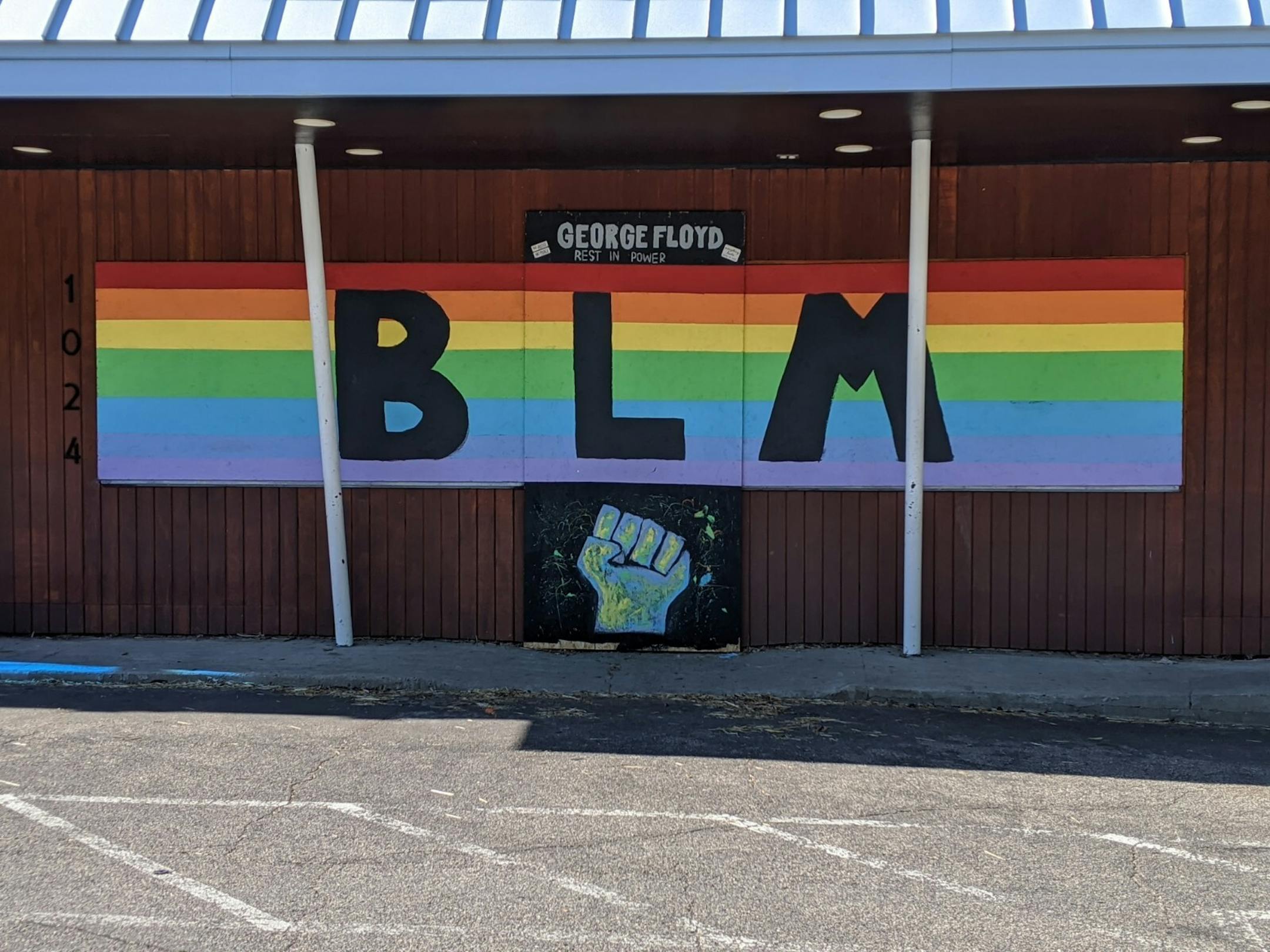 The rainbow mural in support of George Floyd covers the windows of Tiny Diner, located at 1024 E 38th St., just blocks from the spot in front of Cup Foods where George Floyd was killed by police.
