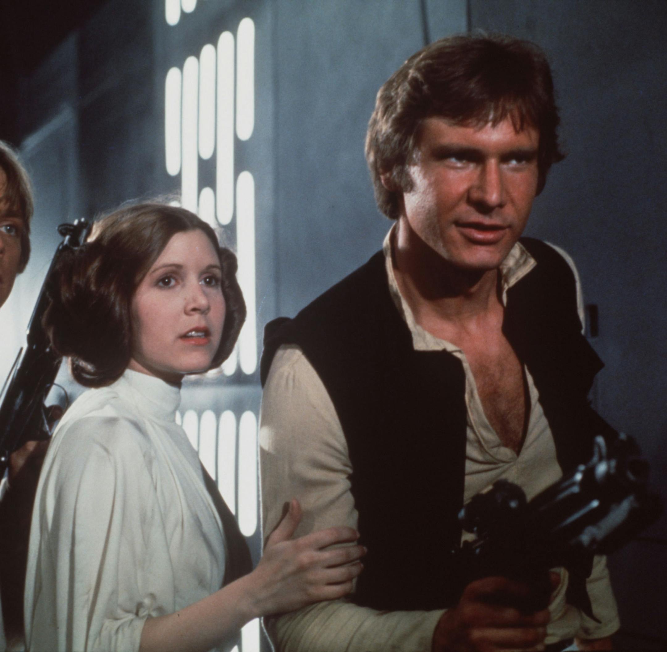 Mark Hamill, left, Carrie Fisher, center, Harrison Ford, right, in a scene from the 1977 movie "Star Wars."