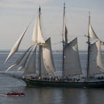 Sandy Hoff drove his jeep boat past the schooner Denis Sullivan out of Milwaukee so his passenger, Kerry Leider, could get a photo. The sailing vessel