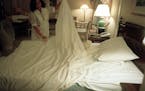 (NYT9) NEW YORK -- Dec. 12, 2000 -- SHEETS-ODYSSEY-1 -- An entire economy revolves around bed sheets. From the hotel that must have a large supply of 