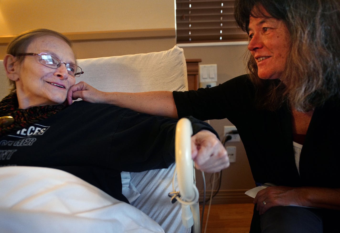 Terry Doyle has been at a nursing home in Robbinsdale since breaking her leg. Sandy O&#x2019;Connell brought her socks as a Christmas present.