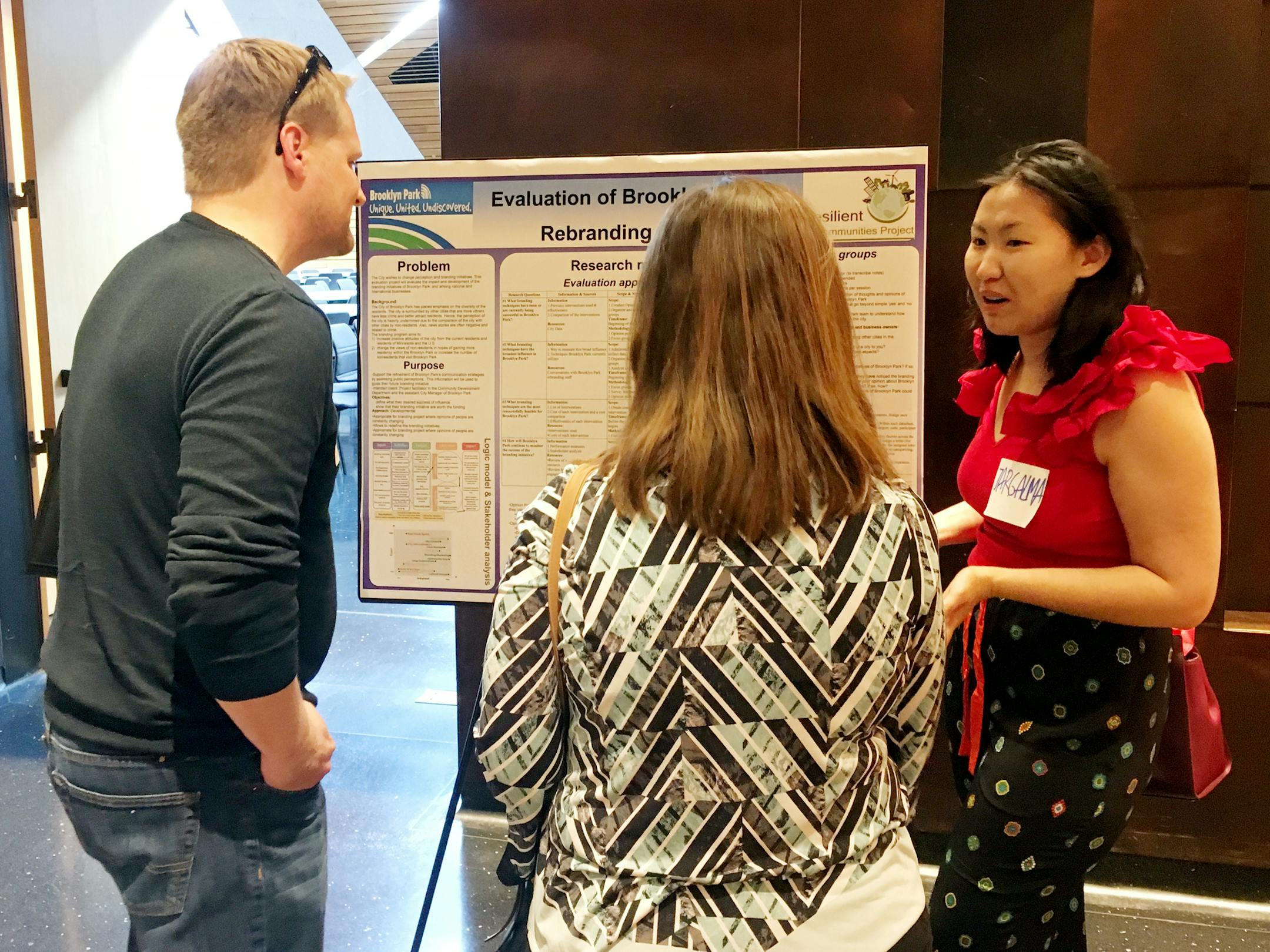 Jargalmaa Erdenemandakh explains her research Friday at a Resilient Communities Project open house.