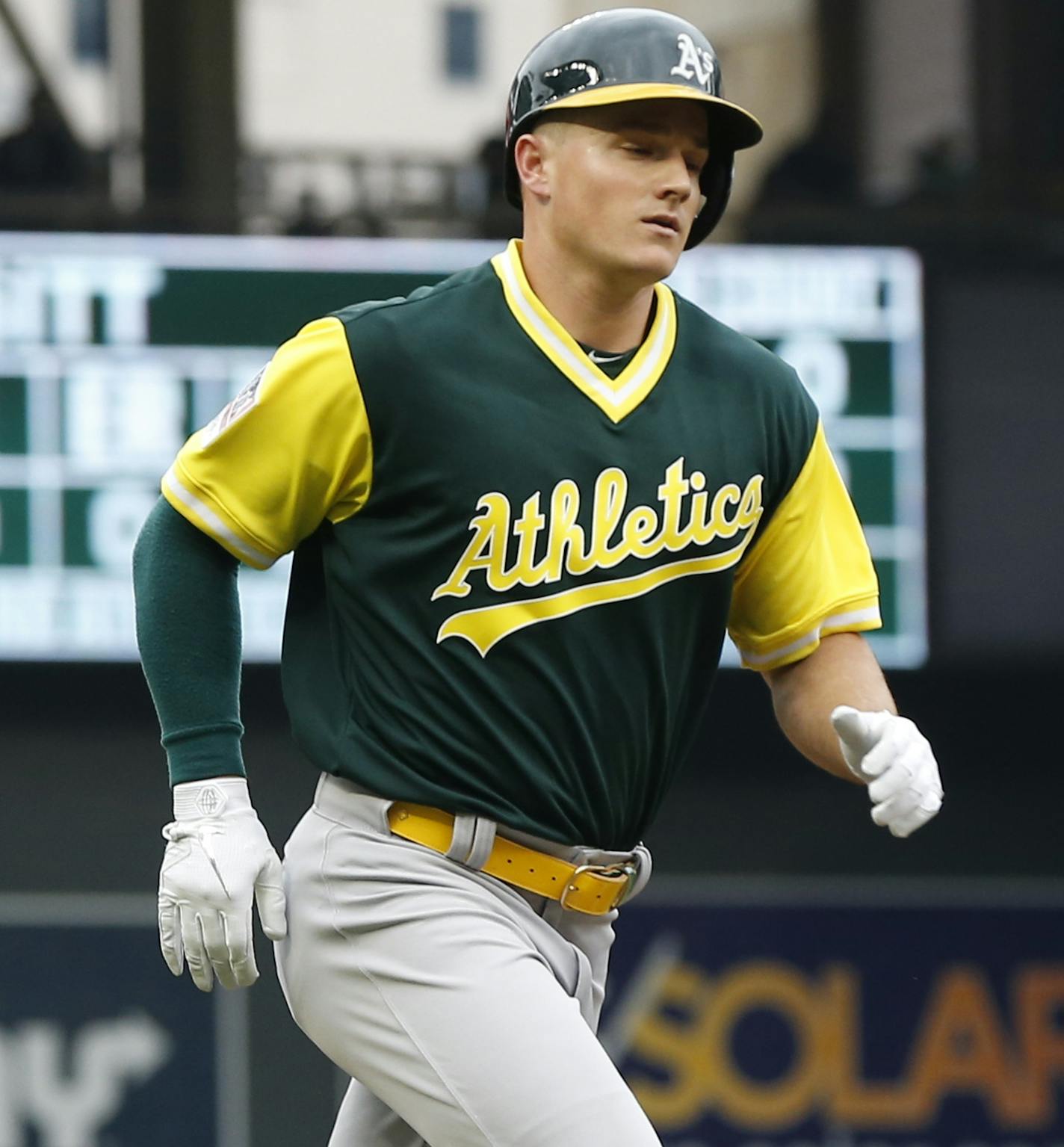 Oakland Athletics' Matt Chapman jogs home on a solo home run off Minnesota Twins pitcher Jose Berrios in the first inning of a baseball game Sunday, Aug. 26, 2018, in Minneapolis. (AP Photo/Jim Mone)