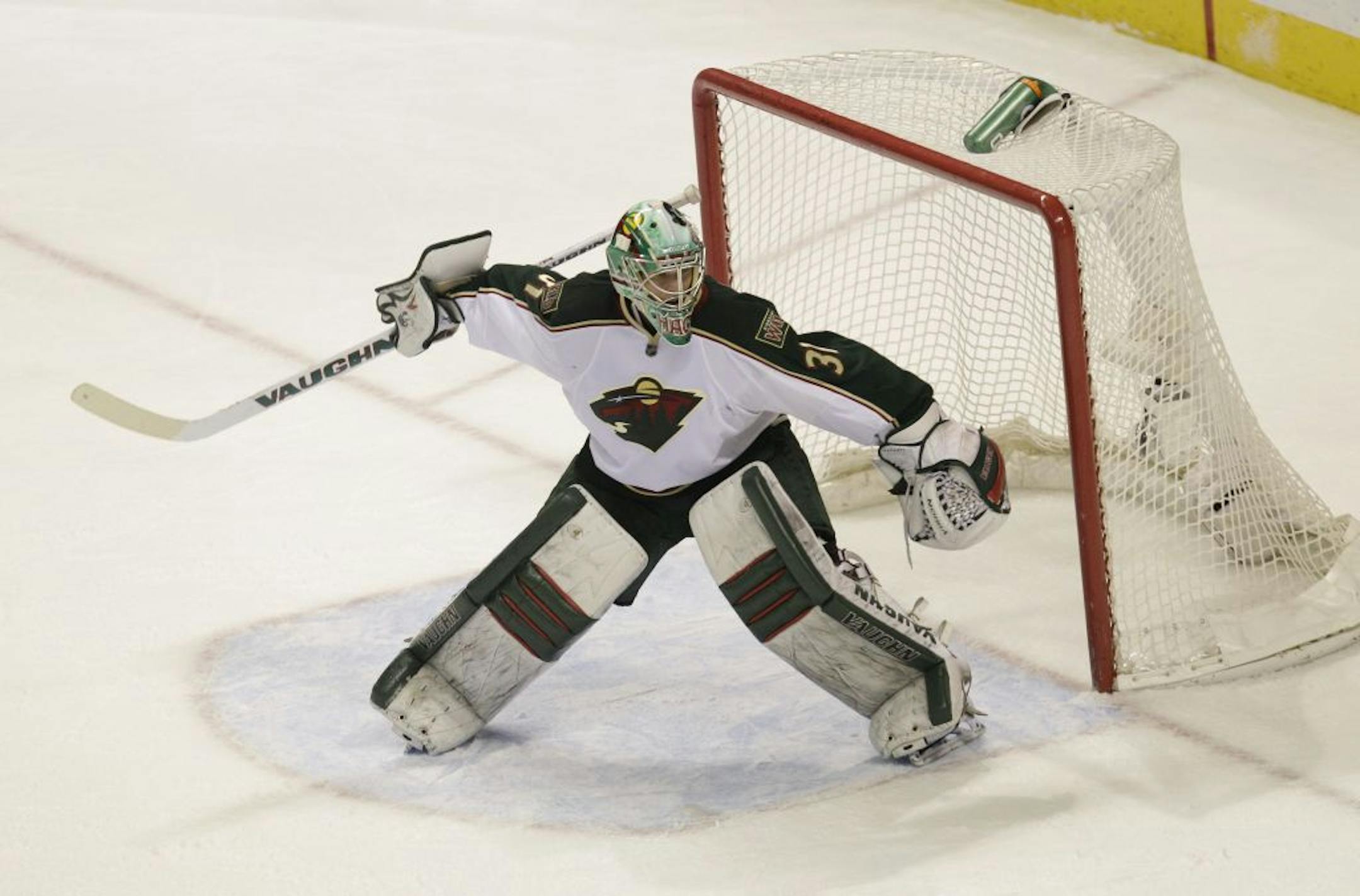 Wild goalie Matt Hackett won his NHL debut by beating San Jose 2-1 on Tuesday. He entered with the Wild trailing 1-0 after Josh Harding suffered whiplash 71 seconds into the game.