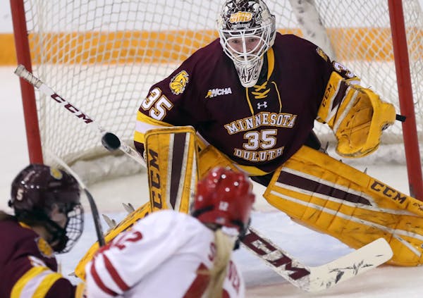 Goalie Maddie Rooney(35) makes another save for the Bulldogs.] UMD women's hockey in WCHA Final against Wisconsin in championship game at Ridder Arena