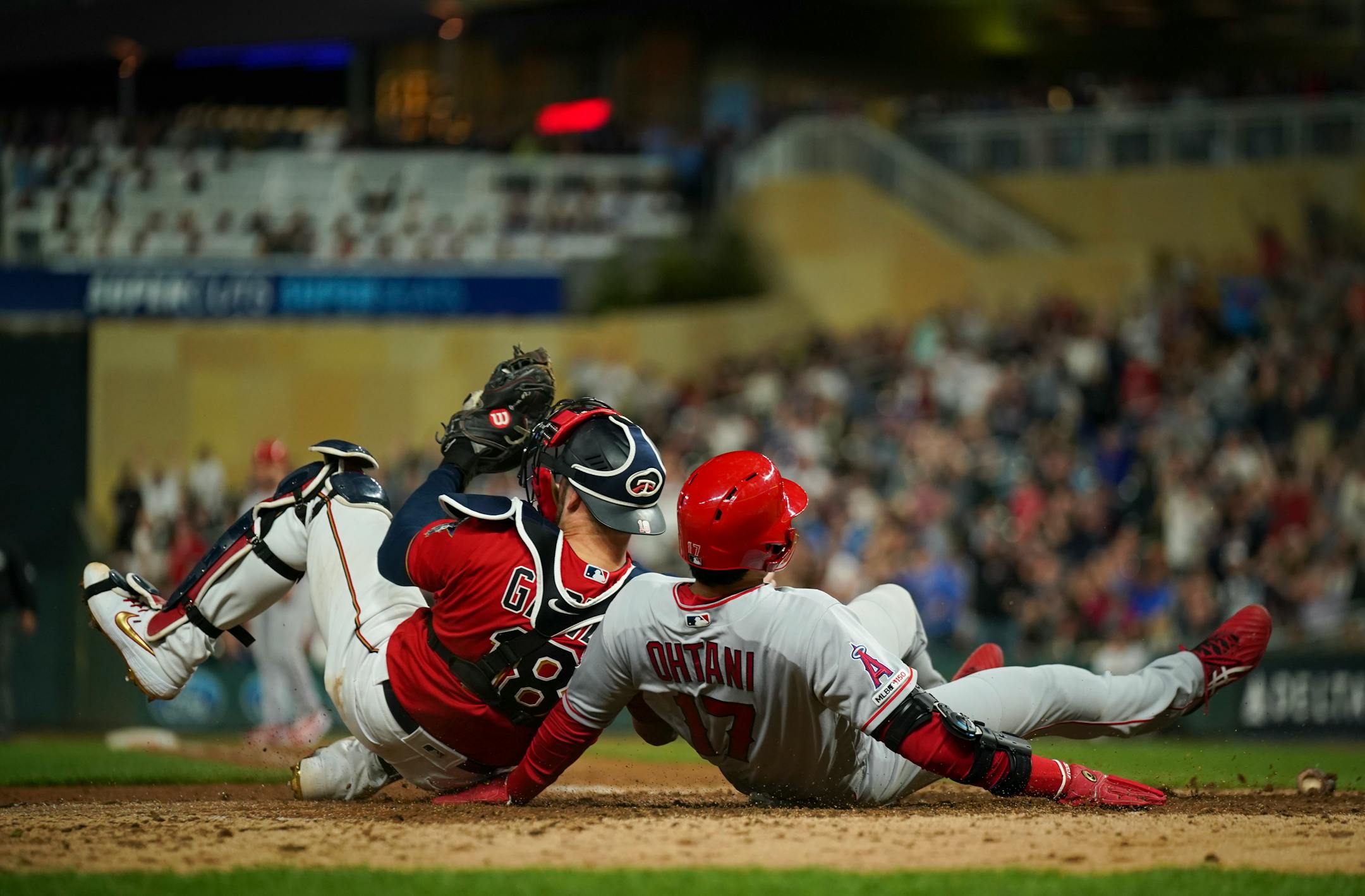 Twins catcher Mitch Garver was injured in a collision at home plate with the Angels' Shohei Ohtani in the eighth inning Tuesday night.