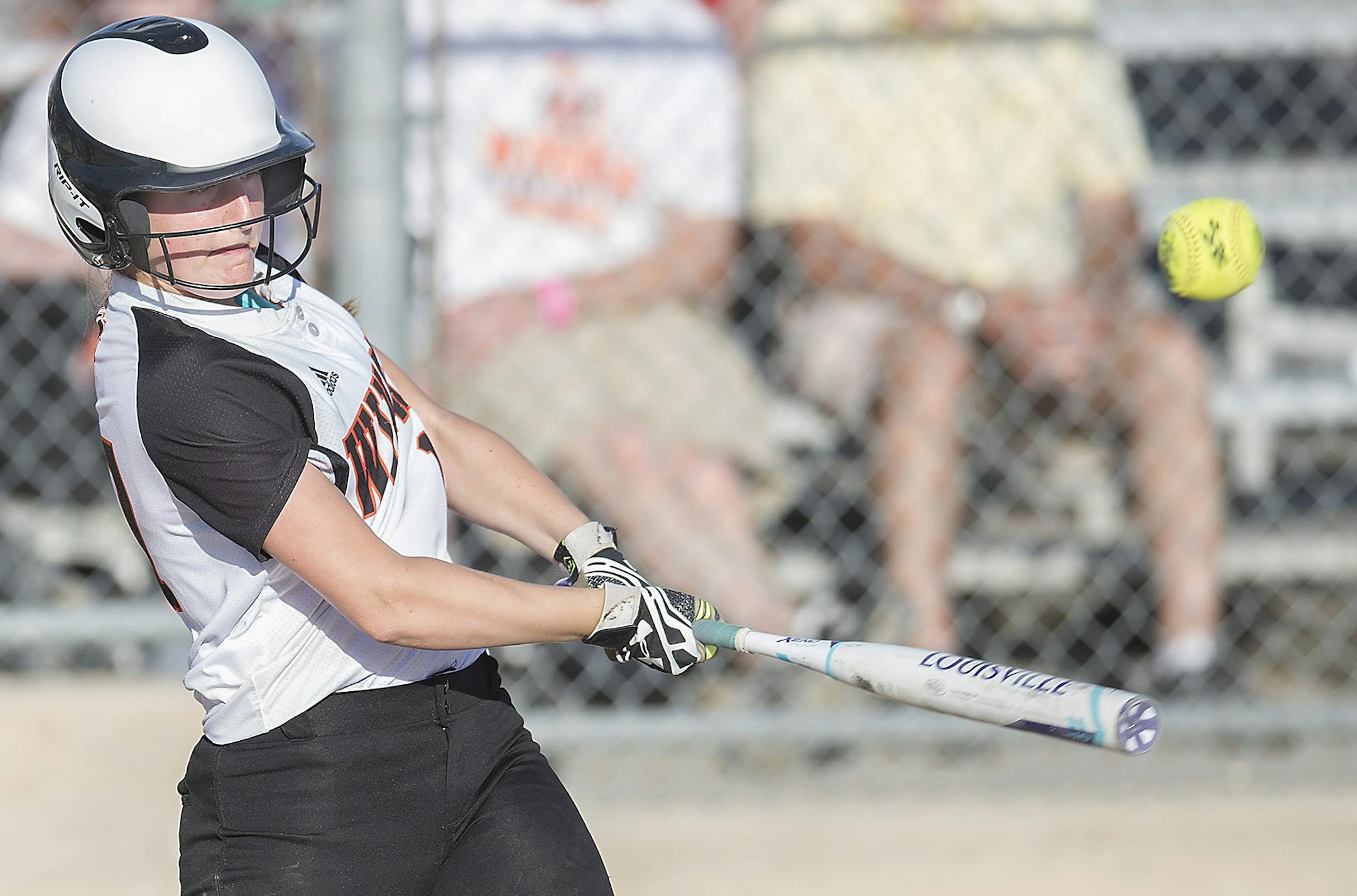 Winona's Lauryn Hamernik made contact with the ball for an RBI in the fourth inning against Totino-Grace at the Girls softball state tournament at Caswell Park, Thursday, June 8, 2017 in North Mankato, MN. ] ELIZABETH FLORES ï liz.flores@startribune.com