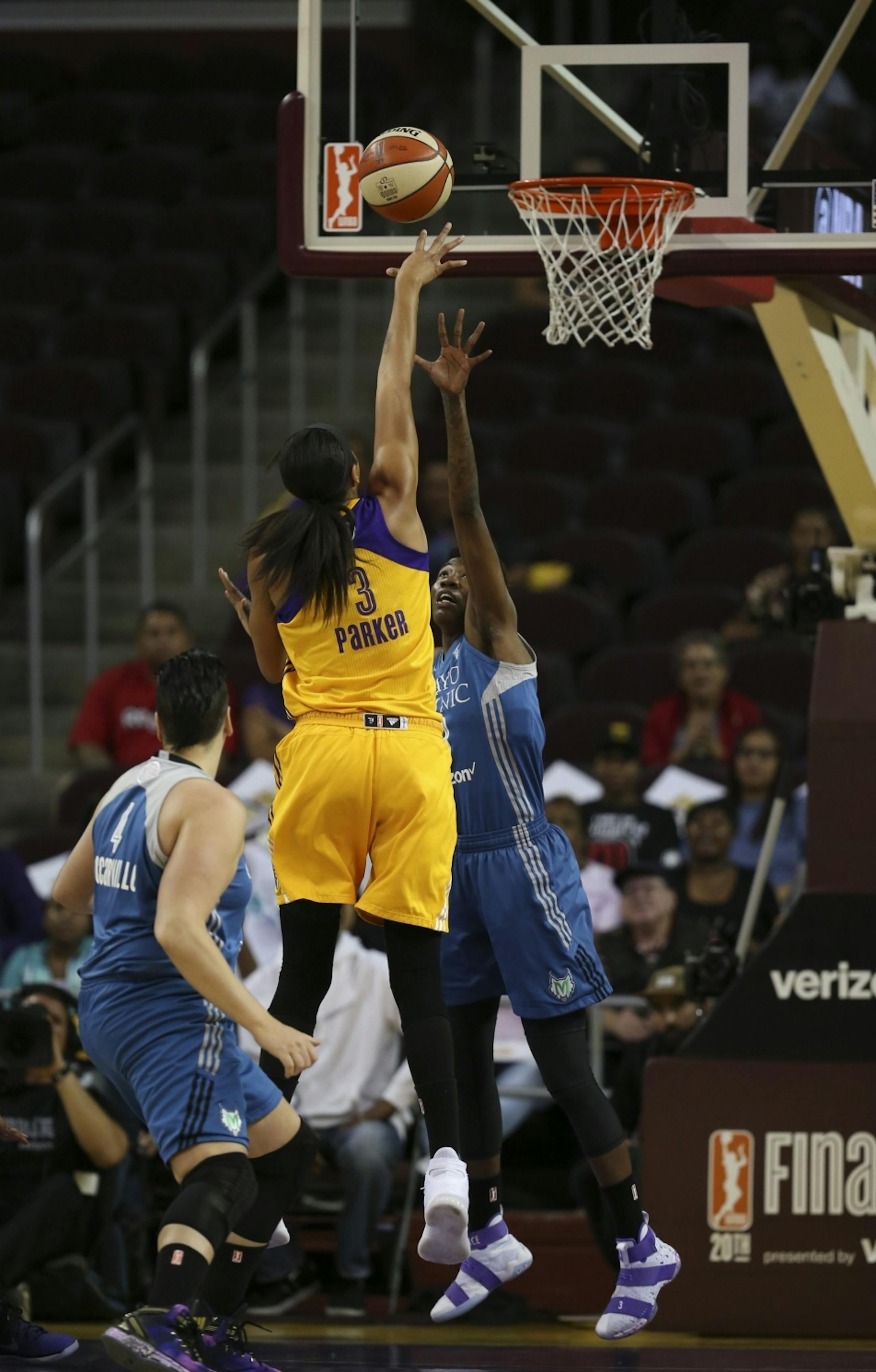 Los Angeles Sparks forward Candace Parker (3) shot over Minnesota Lynx forward Natasha Howard (3) in the first quarter.