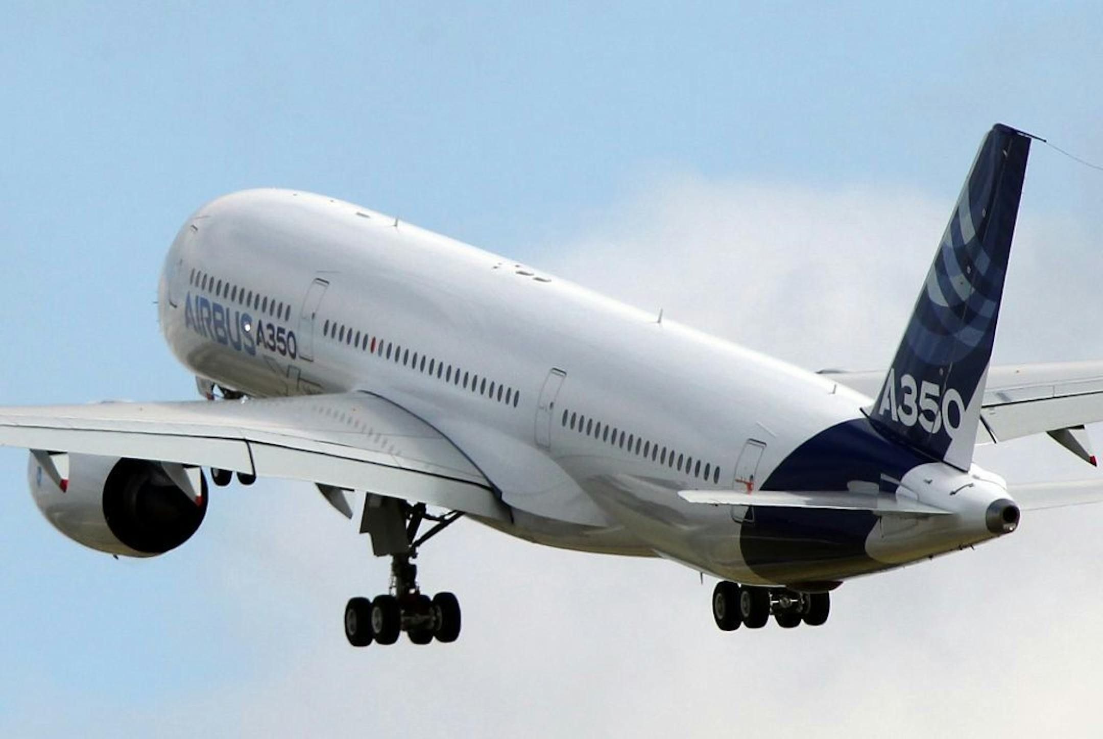 The Airbus A350 takes off on its maiden flight at Blagnac airport near Toulouse, southwestern France, Friday, June 14, 2013. The Airbus A350 has taken off on its maiden flight, setting the stage for intensifying competition with U.S. rival Boeing in the long-haul wide-body aircraft market.