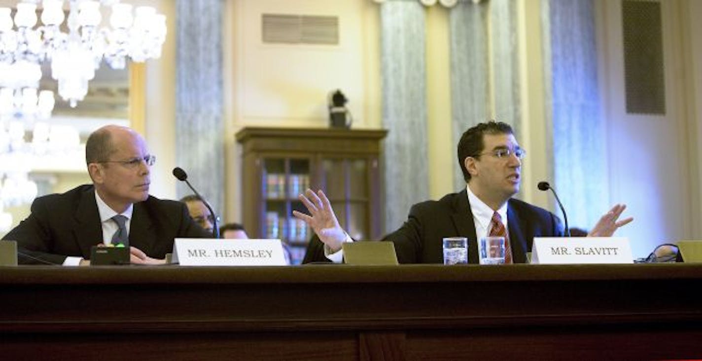 From left, Stephen J. Helmsley, the chief executive of UnitedHealth Group, and Andy M. Slavitt, who heads UnitedHealth�s database business, Ingenix, appear before the Senate commerce committee in Washington on Tuesday, March 31, 2009. The panel is weighing evidence that health insurers had routinely underpaid their customers for out-of-network medical care.