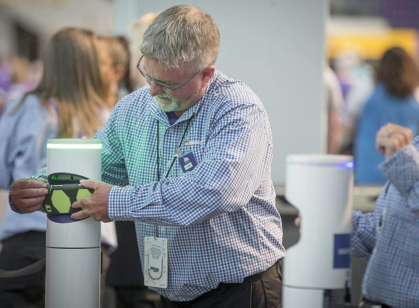 US Bank Stadium ticket agent Chris Regan showed a fan how to use the new system that reads tickets from a cell phone before the Minnesota Vikings took on the Jacksonville Jaguars at US Bank Stadium, Saturday, August 18, 2018 in Minneapolis, MN.