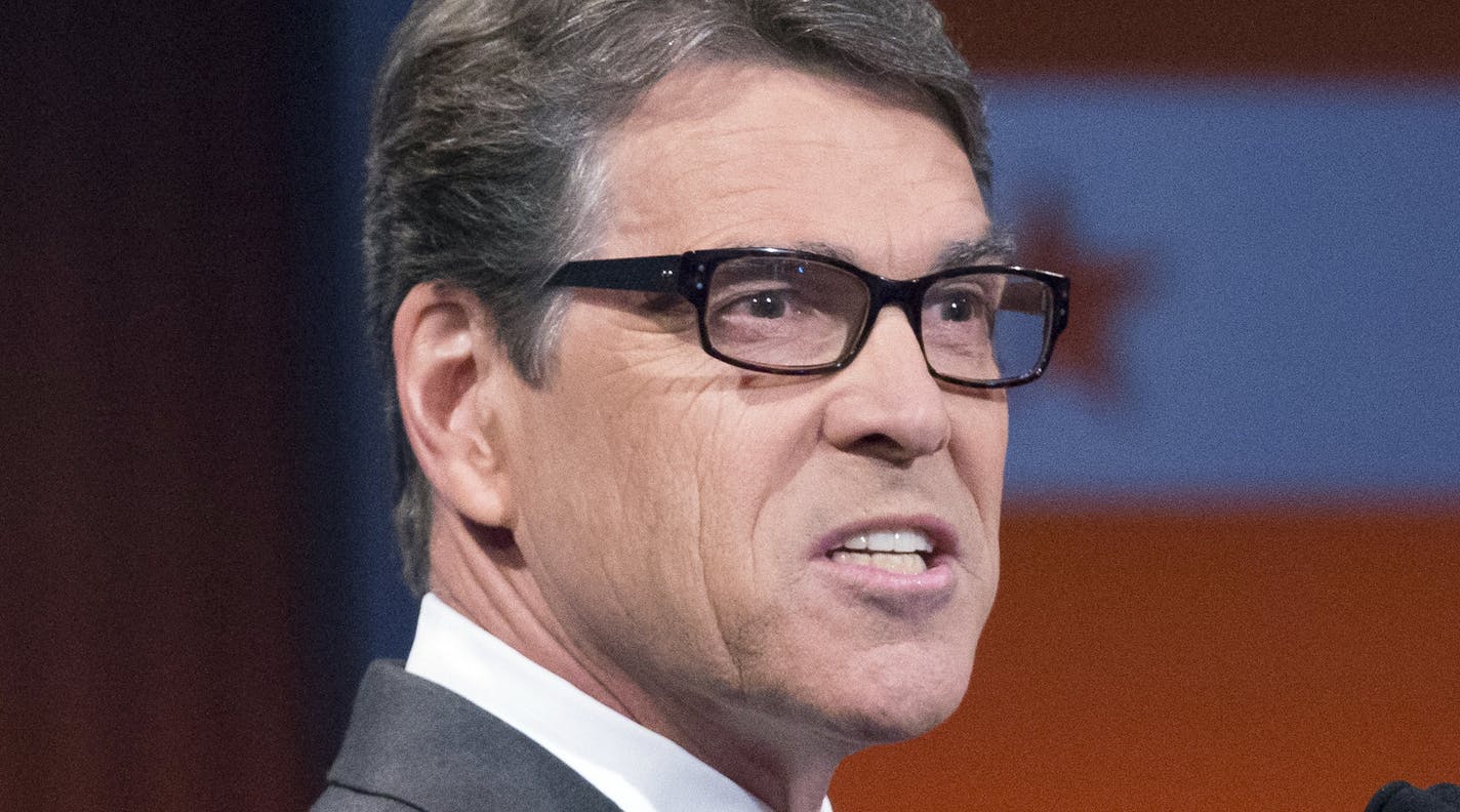 Republican presidential candidate former Texas Gov. Rick Perry speaks during a pre-debate forum at the Quicken Loans Arena, Thursday, Aug. 6, 2015, in Cleveland. Seven of the candidates have not qualified for the prime time debate. (AP Photo/John Minchillo)