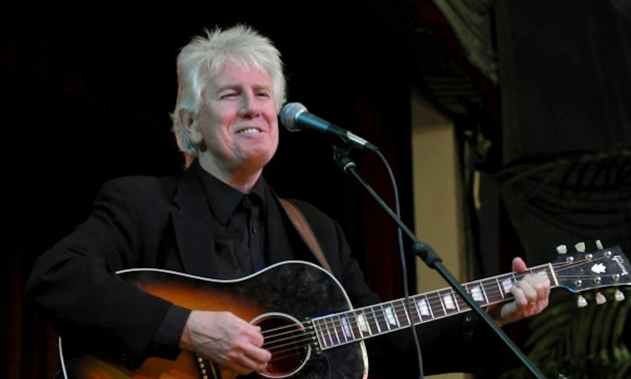 Grahm Nash smiles at the crowd, during The '50 Winter's Later' tribute concert in Clear Lake, Iowa, USA, 02 February 2009.