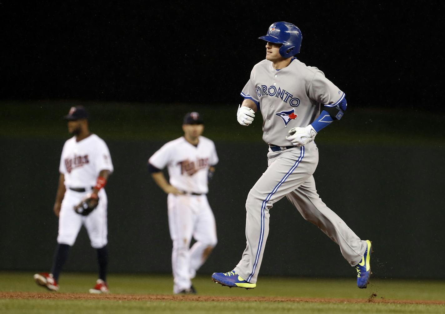 Toronto Blue Jays&#x2019; Josh Donaldson rounds the bases on his three-run home run off Minnesota Twins pitcher Trevor May in the fifth inning of a baseball game, Friday, May 29, 2015, in Minneapolis. (AP Photo/Jim Mone)