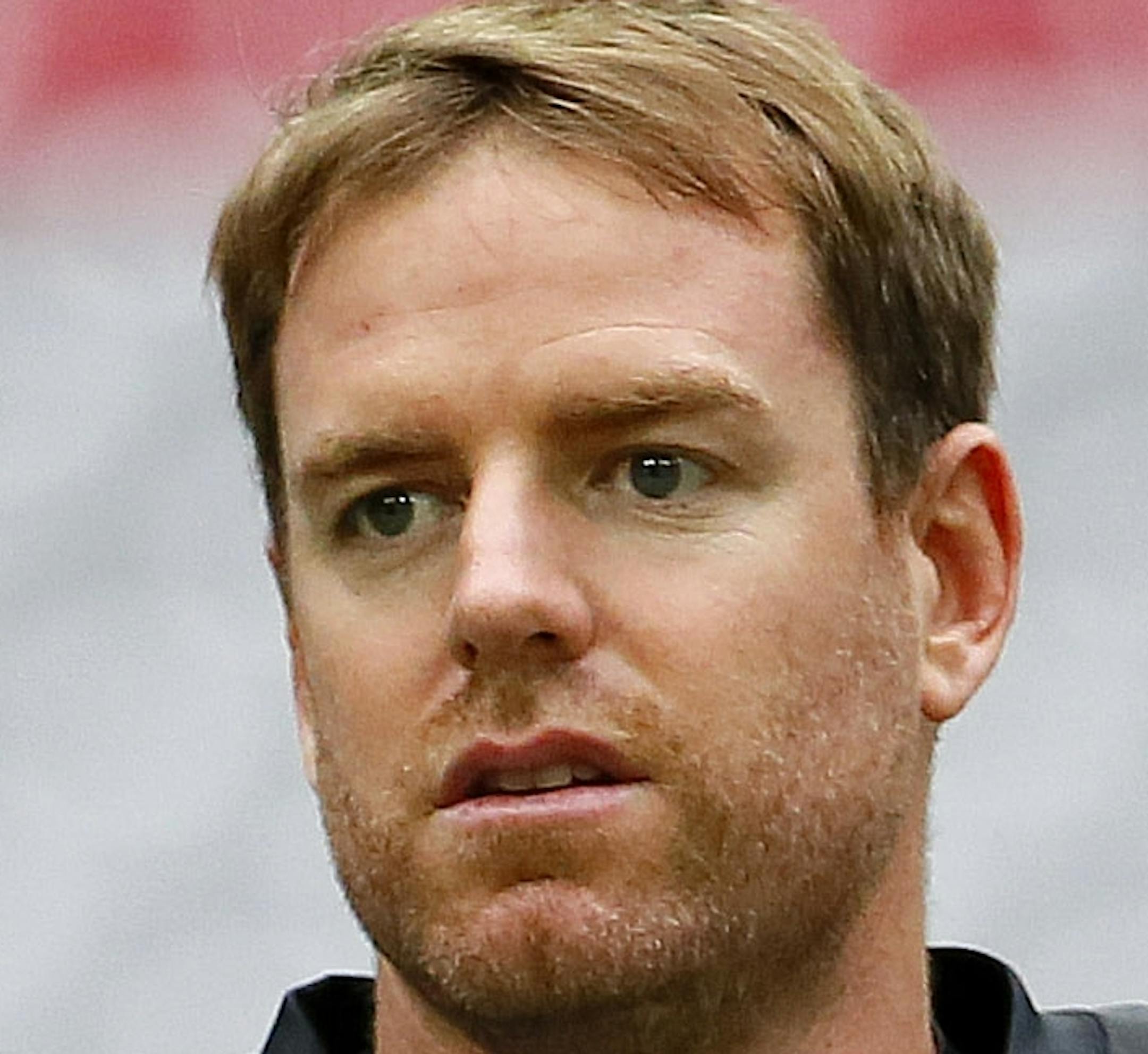 Arizona Cardinals quarterback Carson Palmer (3) runs drills during an NFL football camp, Monday, Aug. 24, 2015, in Glendale, Ariz. (AP Photo/Matt York)
