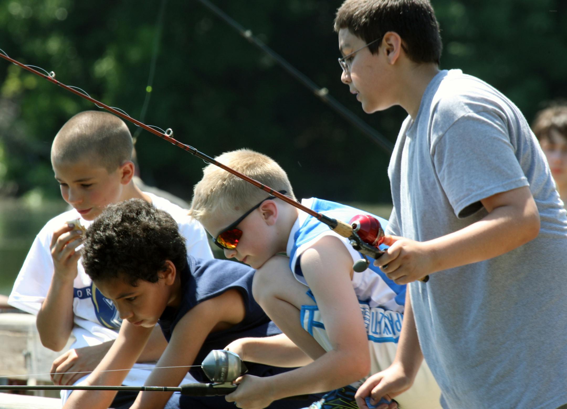 Courtesy of Dakota County Children participated in the 2012 "Take a Kid Fishing Day" at Thompson County Park in West St. Paul.