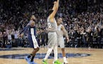 Minnesota Timberwolves Karl-Anthony Towns and Jeff Teague celebrated at the end of Wednesday night's game that clinched a spot in the NBA playoffs.