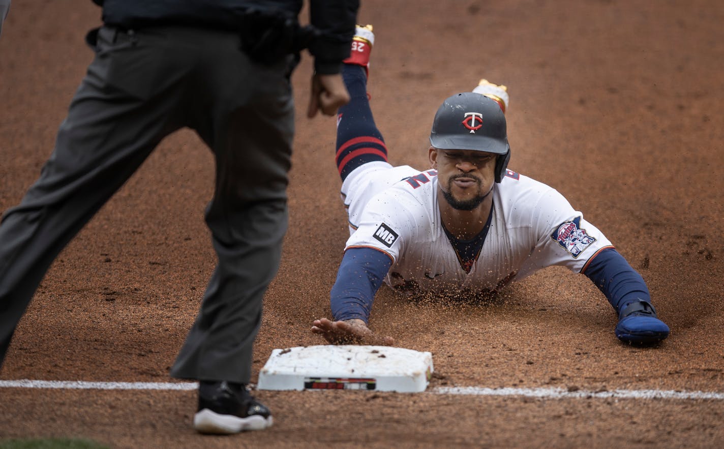 Minnesota Twins center fielder Byron Buxton (25) was safe at third in the third inning at Target Field Sunday April 11, 2021 in Minneapolis, MN.] Jerry Holt •Jerry.Holt@startribune.com