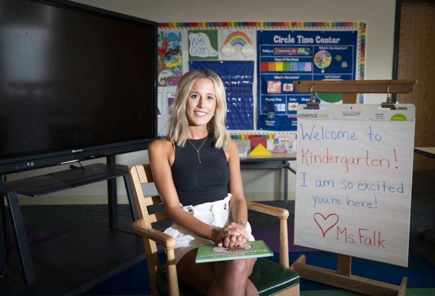 Katie Falk, a first-year kindergarten teacher at Lake Harriet Lower Community School, sat in the little section of her classroom where she has set up for her distance learning classroom in Minneapolis on Aug. 26.