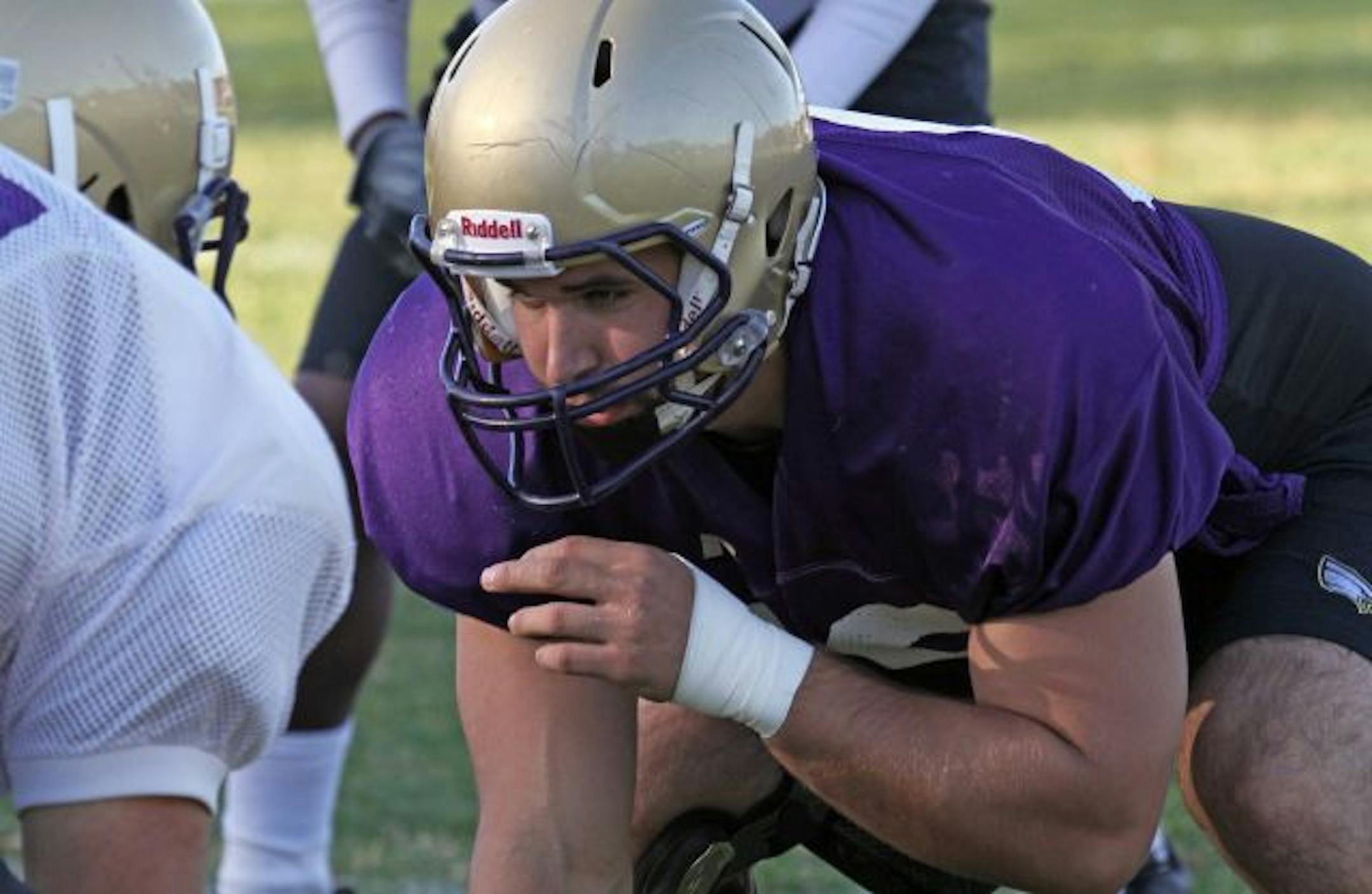 Dave Kleiner of Lakeville had a new perspective on life and leadership when he returned to Northwestern's defensive line after serving in the National Guard in Iraq.