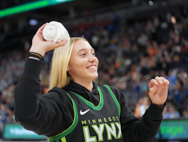 Minnesota native Paige Bueckers tossed T-shirts into the crowd at the Lynx game against Dallas on July 12 at Target Center.