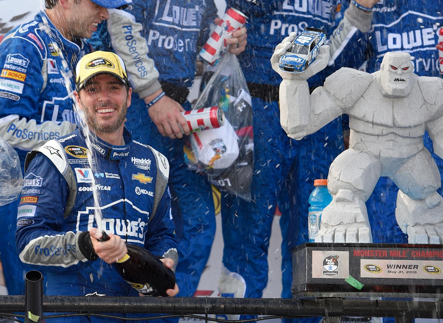 Jimmie Johnson sprayed sparking wine as he celebrated in Victory Lane after he won the NASCAR Sprint Cup series auto race at Dover International Speedway last week.