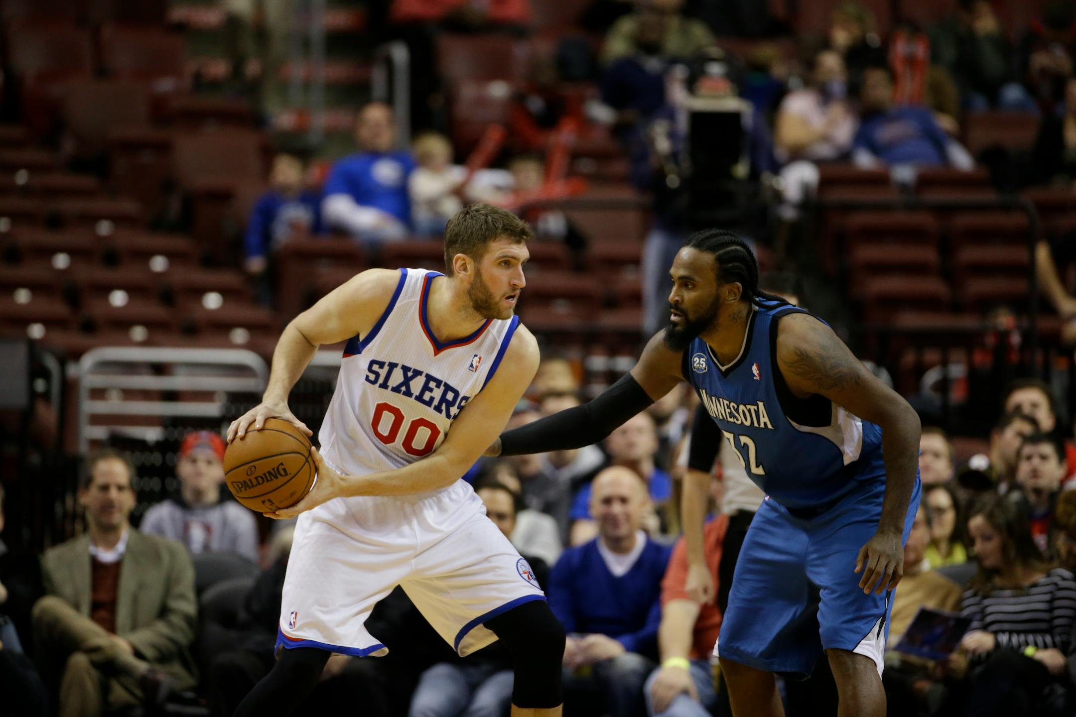 The Timberwolves' Ronny Turiaf, right, guarded Philadelphia's Spencer Hawes on Monday night. Turiaf had been sidelined because of an elbow injury since the second game of the season.