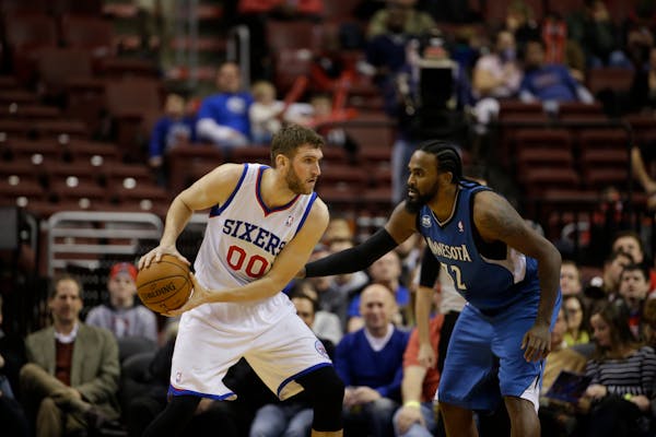 The Timberwolves' Ronny Turiaf, right, guarded Philadelphia's Spencer Hawes on Monday night. Turiaf had been sidelined because of an elbow injury sinc
