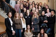 Women who were victims of sexual assault pose for a photo together at the state Capitol in St. Paul in December.